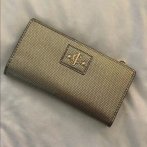 Brand new Juicy Couture gold wallet